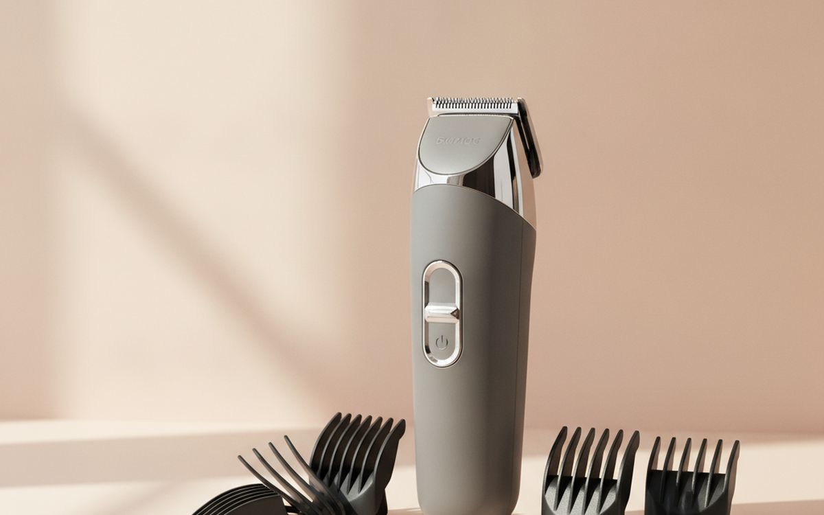 A cordless beard and body trimmer with guards